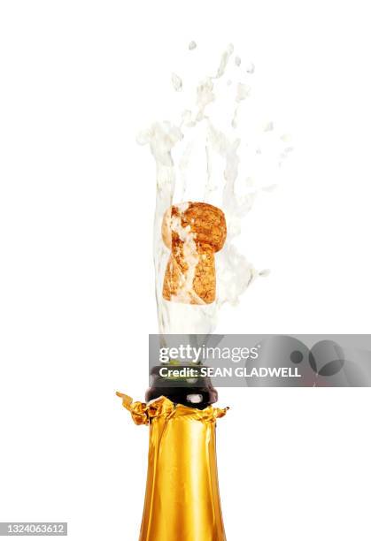 champagne cork popping - champagne cork stock pictures, royalty-free photos & images