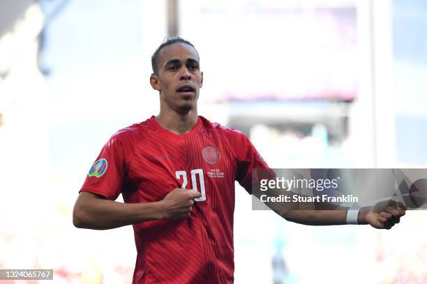 Yussuf Poulsen of Denmark celebrates after scoring their side's first goal during the UEFA Euro 2020 Championship Group B match between Denmark and...