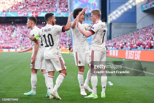 Kevin De Bruyne of Belgium celebrates with Eden Hazard and Axel Witsel after scoring their side's second goal during the UEFA Euro 2020 Championship...