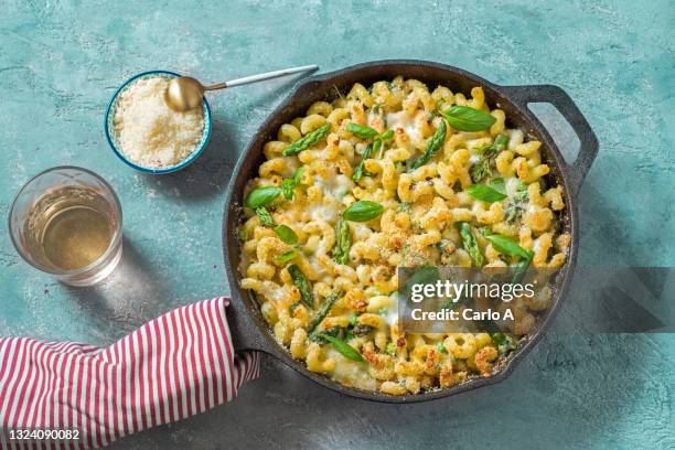 baked pasta with asparagus - macaroni stock pictures, royalty-free photos & images