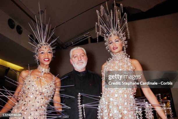 Fashion designer Paco Rabanne poses with models during the Paco Rabanne Haute Couture Spring/Summer 1996 show as part of Paris Fashion Week on...