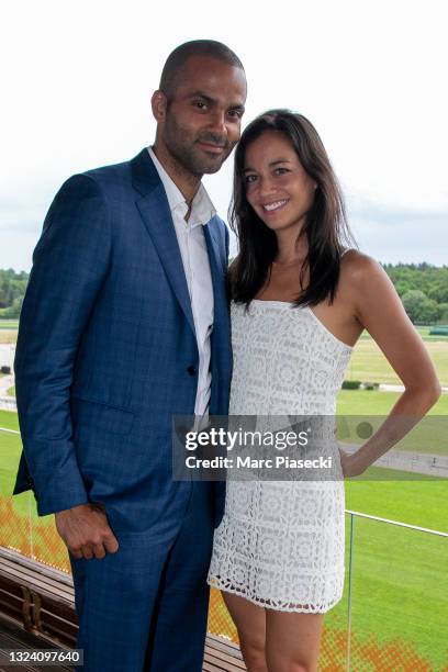 Tony Parker and Alize Lim attend the 'Tony Parker Infinity Nine Horses' press conference at Hippodrome de Longchamp on June 17, 2021 in Paris,...