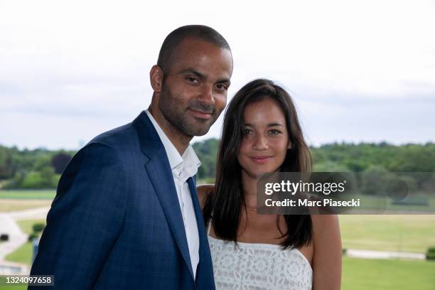 Tony Parker and Alize Lim attend the 'Tony Parker Infinity Nine Horses' press conference at Hippodrome de Longchamp on June 17, 2021 in Paris,...