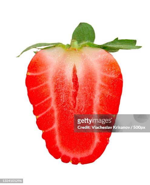 ripe red strawberry on an isolated white background - 正中縦断 ストックフォトと画像