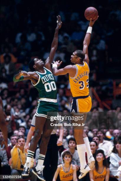 Los Angeles Lakers Kareem Abdul-Jabbar attempts a hook shot over Boston Celtics Robert Parish during 1985 NBA Finals between Los Angeles Lakers and...