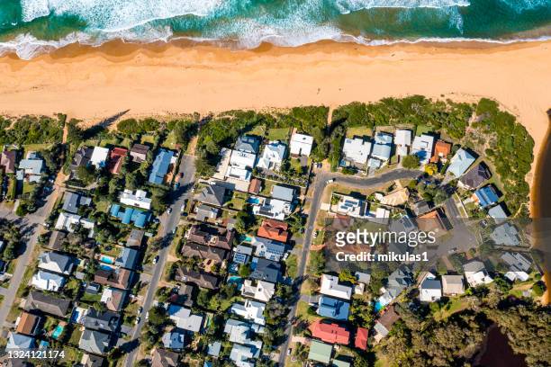coastal suburb overhead perspective roof tops - beach bird's eye perspective stock pictures, royalty-free photos & images