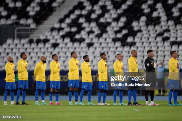 Players of Brazil line up for the national anthem prior to a match between Brazil and Peru as part of Group B of Copa America Brazil 2021 at Estadio...