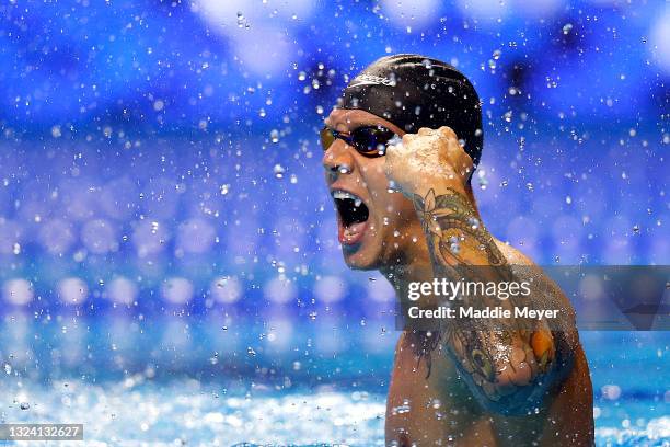 Caeleb Dressel of the United States reacts after competing in the Men’s 100m freestyle final during Day Five of the 2021 U.S. Olympic Team Swimming...