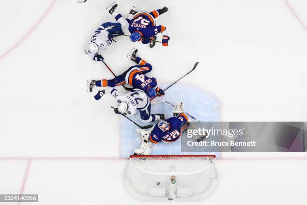 Brayden Point of the Tampa Bay Lightning scores a goal past Semyon Varlamov of the New York Islanders during the second period in Game Three of the...