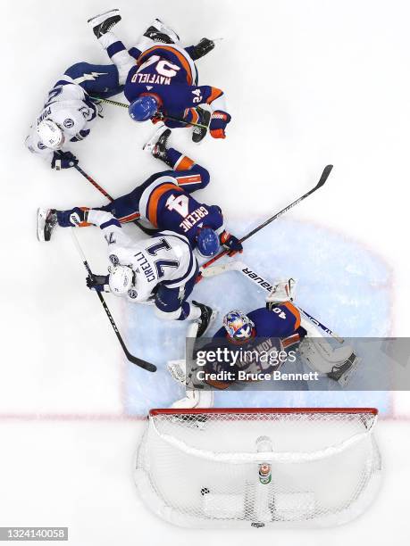 Brayden Point of the Tampa Bay Lightning scores a goal past Semyon Varlamov of the New York Islanders during the second period in Game Three of the...