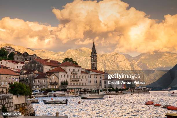 sunset view of the historic town of perast at bay of kotor. montenegro - kotor stock-fotos und bilder