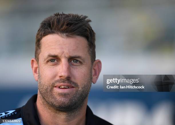 Sharks coach Josh Hannay looks on before the start of the round 15 NRL match between the North Queensland Cowboys and the Cronulla Sharks at QCB...