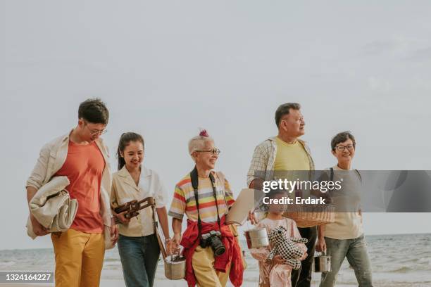 eco-friendly tourists travel to the beach for their picnic and holiday - stock photo - the package tour stock pictures, royalty-free photos & images