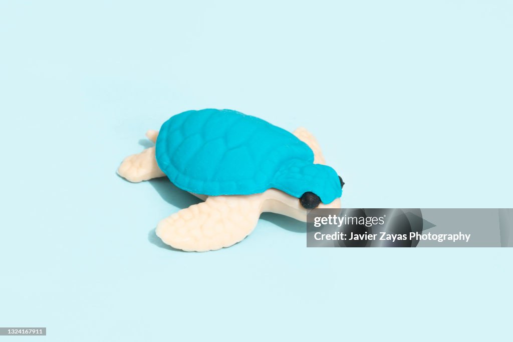 Sea Turtle Toy On Blue Background