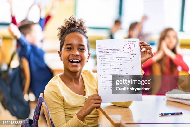 i've got an a on my exam! - pics of the letter a stock pictures, royalty-free photos & images