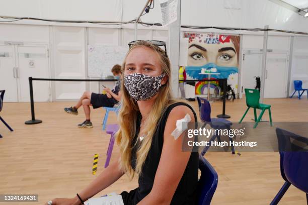Year old Robyn Coatsworth sits in a monitoring room after receiving her first Pfizer Covid-19 jab at Stithians Vaccination Centre on June 18, 2021 in...