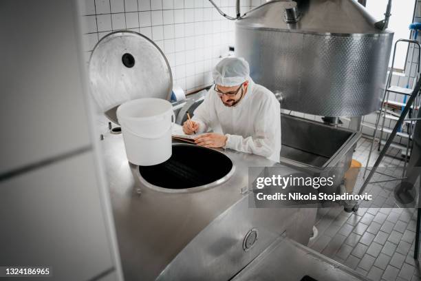 cheese maker at the manufacturing - dairy factory stock pictures, royalty-free photos & images