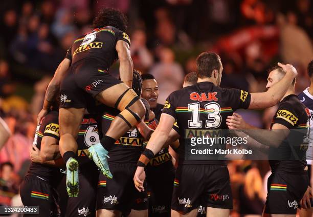 Nathan Cleary of the Penrith Panthers celebrates after scoring a try during the round 15 NRL match between the Penrith Panthers and the Sydney...