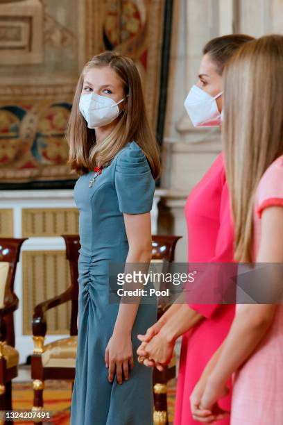 Princess Leonor, Queen Letizia of Spain and Princess Sofia attend the "Order of the Civil Merit" ceremony at the Royal Palace on June 18, 2021 in...
