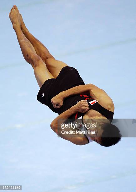 Gabriel Zi Jie Gan of Singapore competes in the Mens Team Artistic on day two of the 2011 Southeast Asian Games at Jakabaring Sports Complex on...