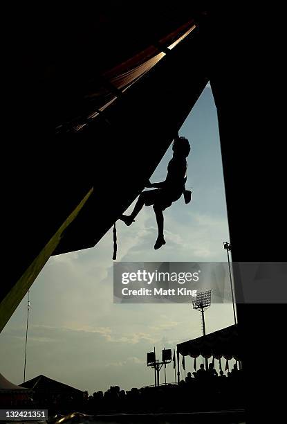 Hafzanizam Bakhori of Malaysia competes in the Mens Sport Climbing on day two of the 2011 Southeast Asian Games at Jakabaring Sports Complex on...