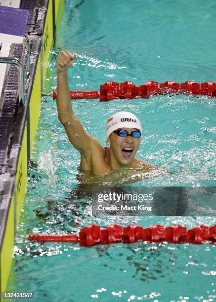 Zheng Wen Quah of Singapore celebrates winning the Mens 400m Individual Medley Final on day two of the 2011 Southeast Asian Games at Jakabaring...