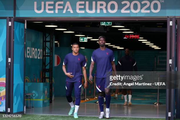 Kylian Mbappe and Paul Pogba of France take to the field during the France Training Session ahead of the UEFA Euro 2020 Championship Group F match...