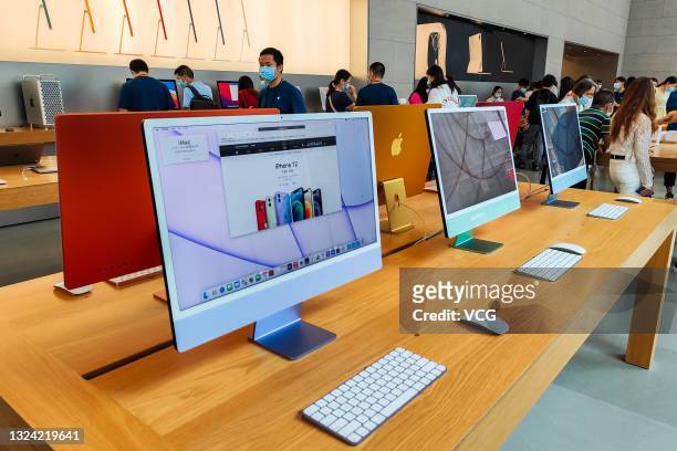 IMac computers are on display at an Apple flagship store at Nanjing Road shopping street on June 18, 2021 in Shanghai, China.