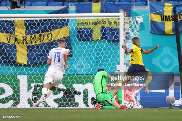 Robin Quaison of Sweden is fouled by Martin Dubravka of Slovakia leading to a penalty being awarded during the UEFA Euro 2020 Championship Group E...