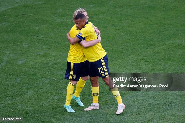 Emil Forsberg of Sweden celebrates with Robin Quaison after scoring their side's first goal during the UEFA Euro 2020 Championship Group E match...