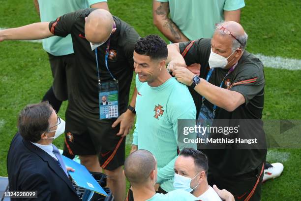 Cristiano Ronaldo of Portugal has his performance analysis device fitted prior to the Portugal Training Session ahead of the UEFA Euro 2020 Group F...