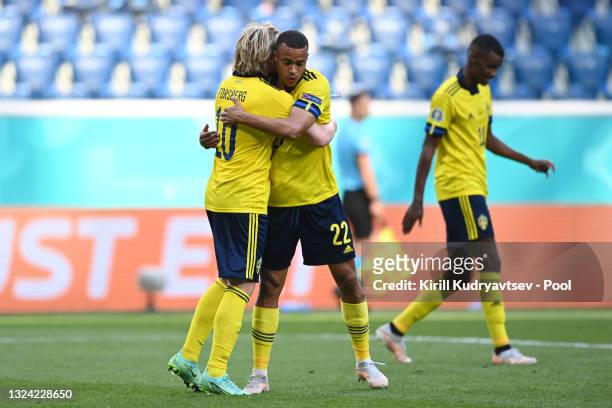Emil Forsberg of Sweden celebrates with Robin Quaison after scoring their side's first goal during the UEFA Euro 2020 Championship Group E match...