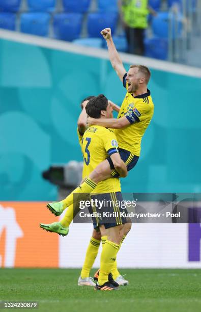 Sebastian Larsson and Gustav Svensson of Sweden celebrate after victory in the UEFA Euro 2020 Championship Group E match between Sweden and Slovakia...