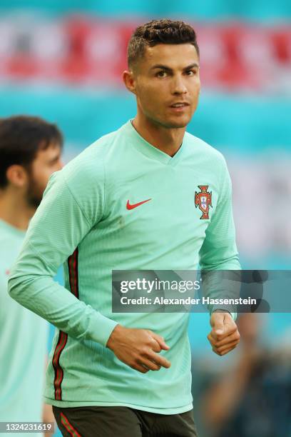 Cristiano Ronaldo of Portugal looks on during the Portugal Training Session ahead of the UEFA Euro 2020 Group F match between Portugal and Germany at...
