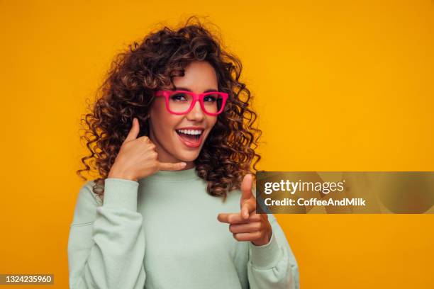 portrait of a young emotional woman - call me beautiful stock pictures, royalty-free photos & images