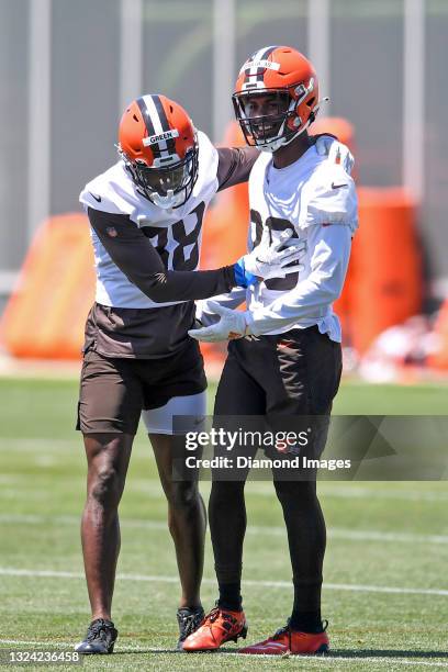 Cornerback Greedy Williams of the Cleveland Browns jokes with A.J. Green during a mini camp at the Cleveland Browns training facility on June 16,...