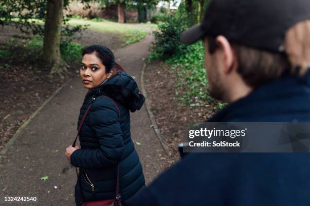 i am scared - person looking behind stock pictures, royalty-free photos & images