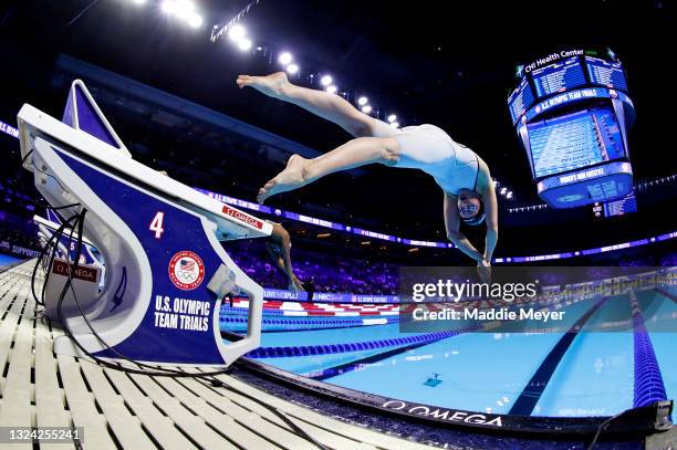 Olivia Smoliga competes in a semifinal heat for the Women's 100m freestyle during Day Five of the 2021 U.S. Olympic Team Swimming Trials at CHI...