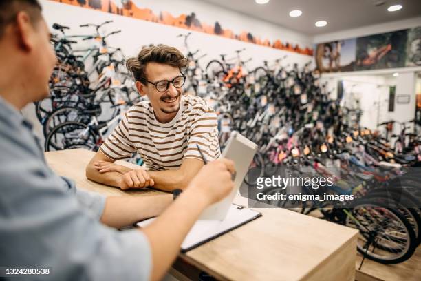 i decided which bike to buy - bike shop stock pictures, royalty-free photos & images