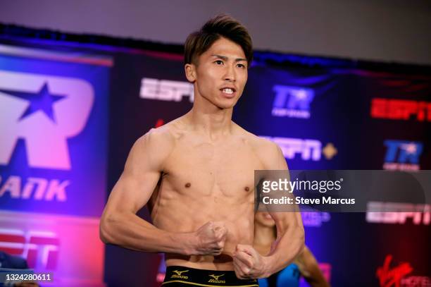 Bantamweight champion Naoya Inoue of Japan poses on the scale during an official weigh-in at Virgin Hotels Las Vegas on June 18, 2021 in Las Vegas,...