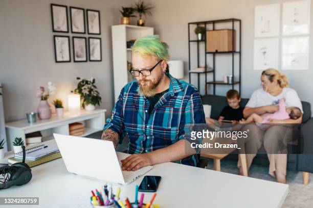 parents with kids working from home, attending business meeting over video call on laptop - green hair stock pictures, royalty-free photos & images