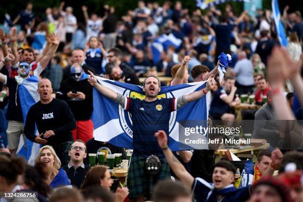 Scotland fans react as they support their team in the Euro 2020 game against England on June 18, 2021 in Glasgow, Scotland. England V Scotland is not...