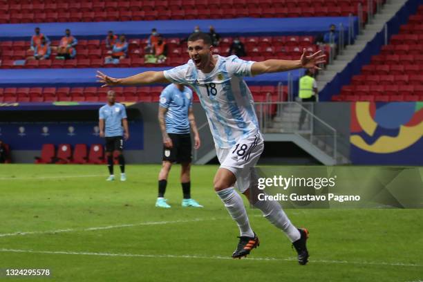 Guido Rodriguez of Argentina celebrates after scoring the first goal of his team during a group A match between Argentina and Chile as part of...