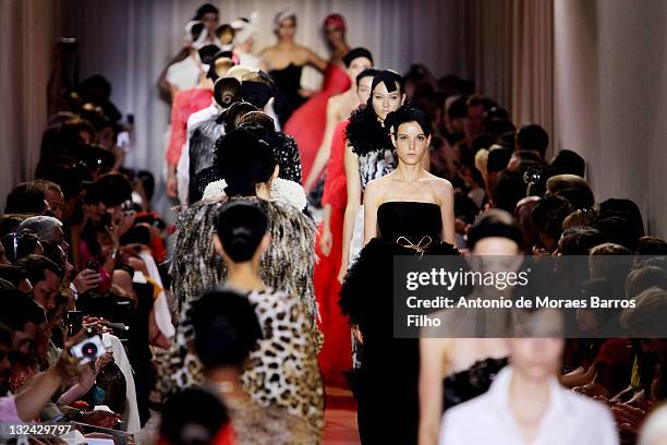 Model walks the runway during the Giambatista Valli Haute Couture Fall/Winter 2011/2012 show as part of Paris Fashion Week at Galerie De La Madeleine...