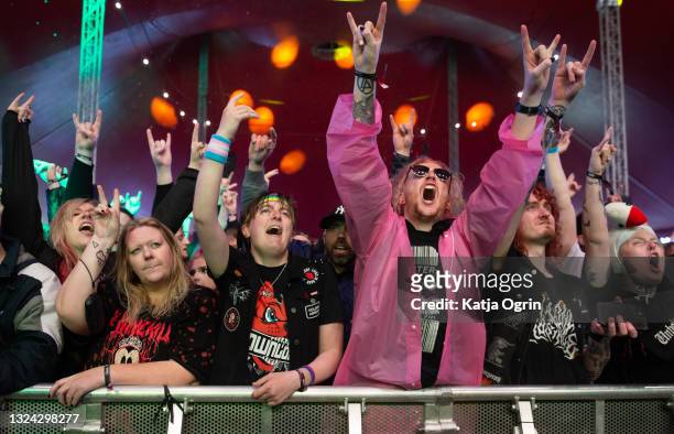Music fans enjoy live perofrmances during Download Festival at Donington Park on June 18, 2021 in Donington, England. Download Pilot is a 10,000...