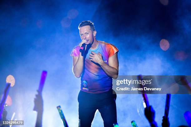 Chris Martin of Coldplay performs during pre-taping of the Macy's 4th of July Firework Show at Hunter's Point South Park on June 17, 2021 in New York...