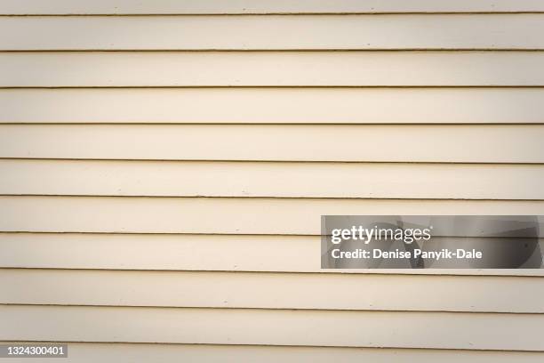 painted siding planks on house - revestimiento de paredes fotografías e imágenes de stock