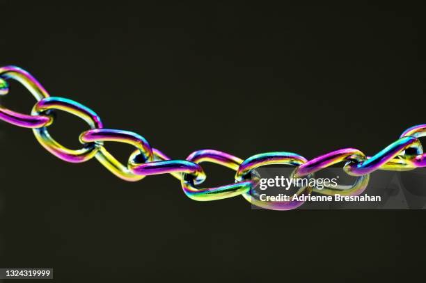 rainbow titanium link chain - chain stock pictures, royalty-free photos & images