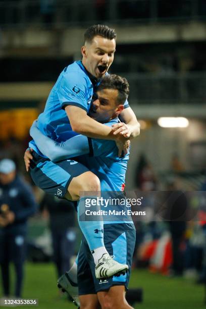 Bobo of Sydney FC celebrates a goal with Alexander Baumjohann during the A-League Semi-Final match between Sydney FC and Adelaide United at Netstrata...