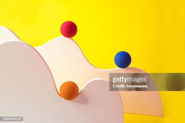 abstract minimalist geometric shapes coloured sphere still life.. - triple stock pictures, royalty-free photos & images